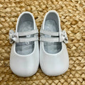 Scarpe battesimo bimba in pelle bianca con fiocco