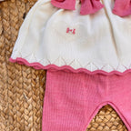 Scarpette in lana panna con fiocchi rosa
