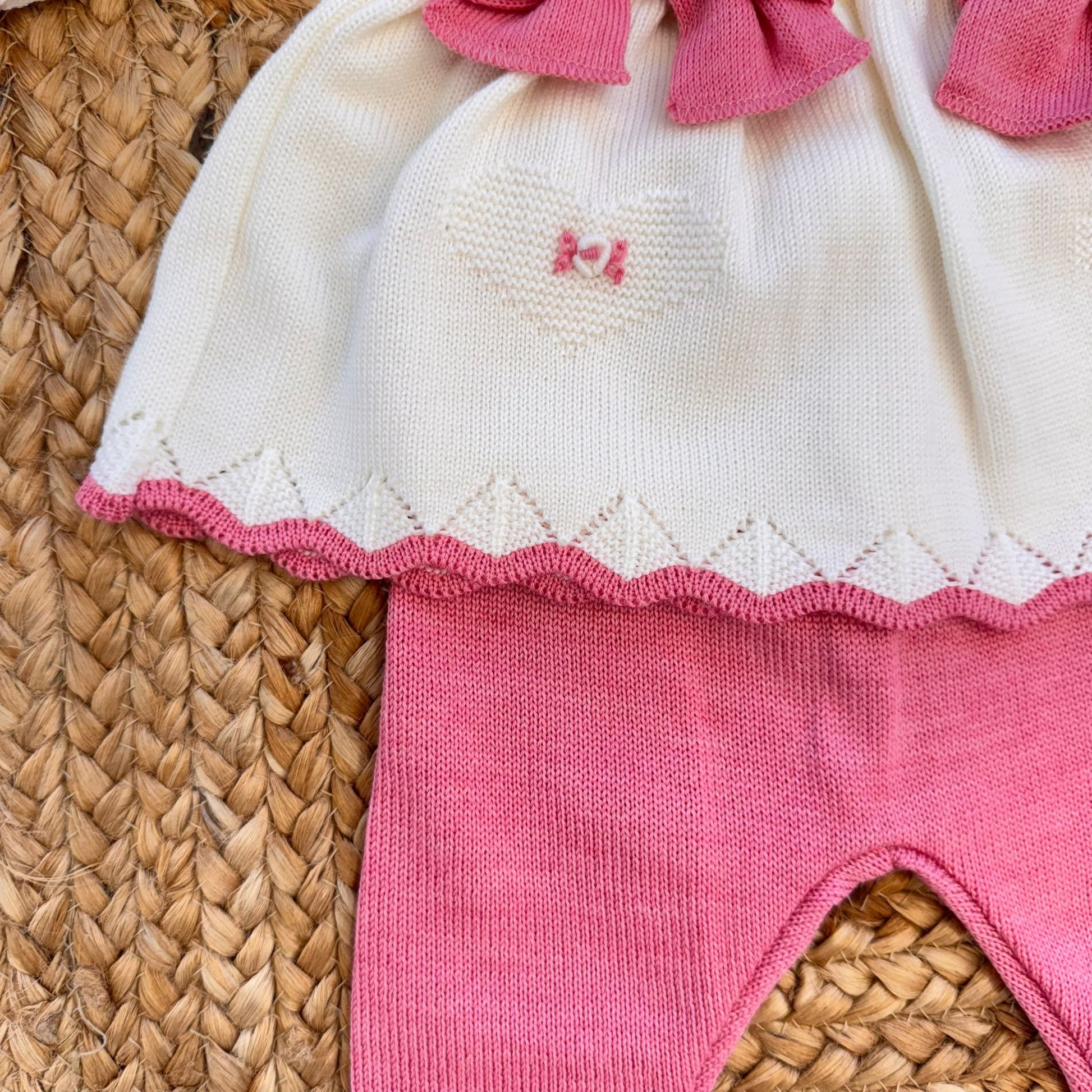Scarpette in lana panna con fiocchi rosa