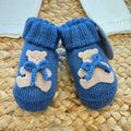 Scarpette neonato pura lana blu con orsetto