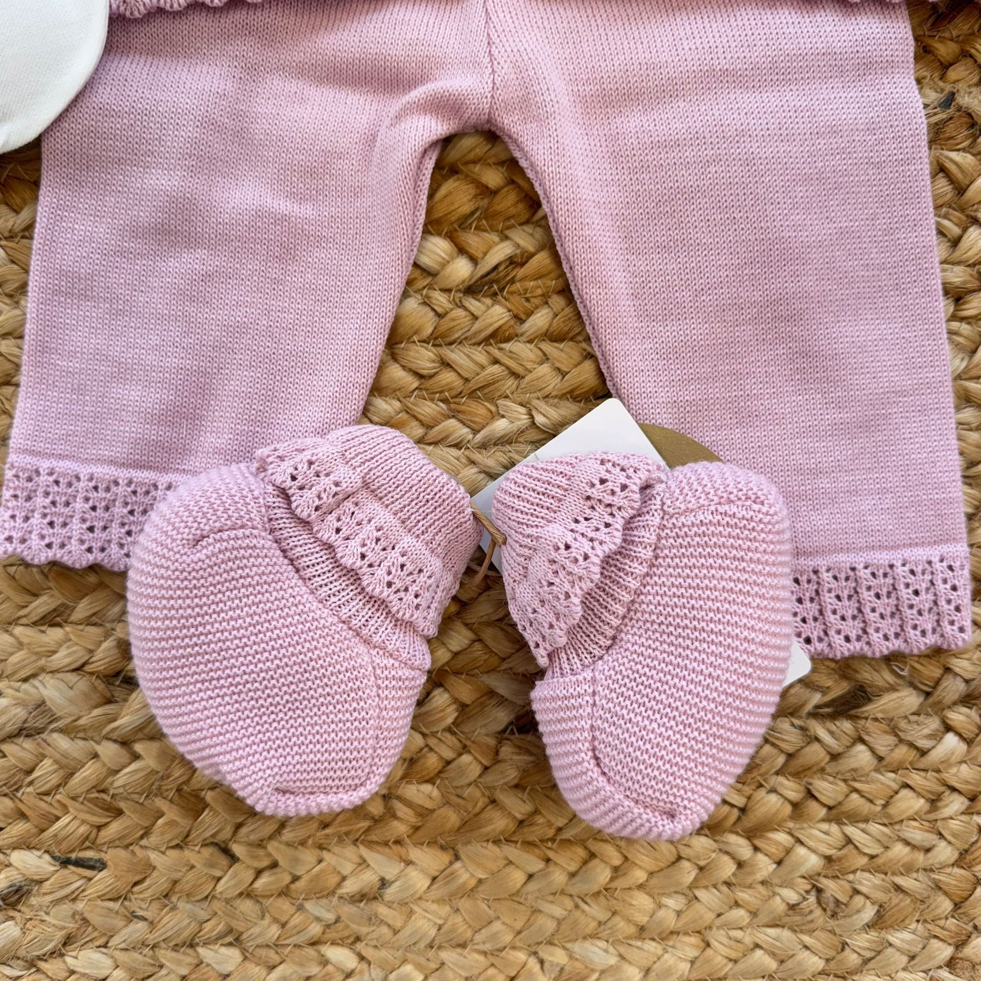 Scarpine neonata rosa in lana e acrilico con bordo lavorato