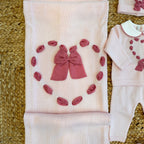 Scarpine rosa con maxi fiocchi ciclamino.