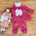 Tutina neonata ciniglia rosa con fiocco e ricami floreali a mano