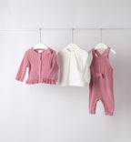 Tutina neonata in maglia rosa con cardigan e blusa