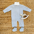 Tutina neonato pura lana azzurra con treccia e scarpette