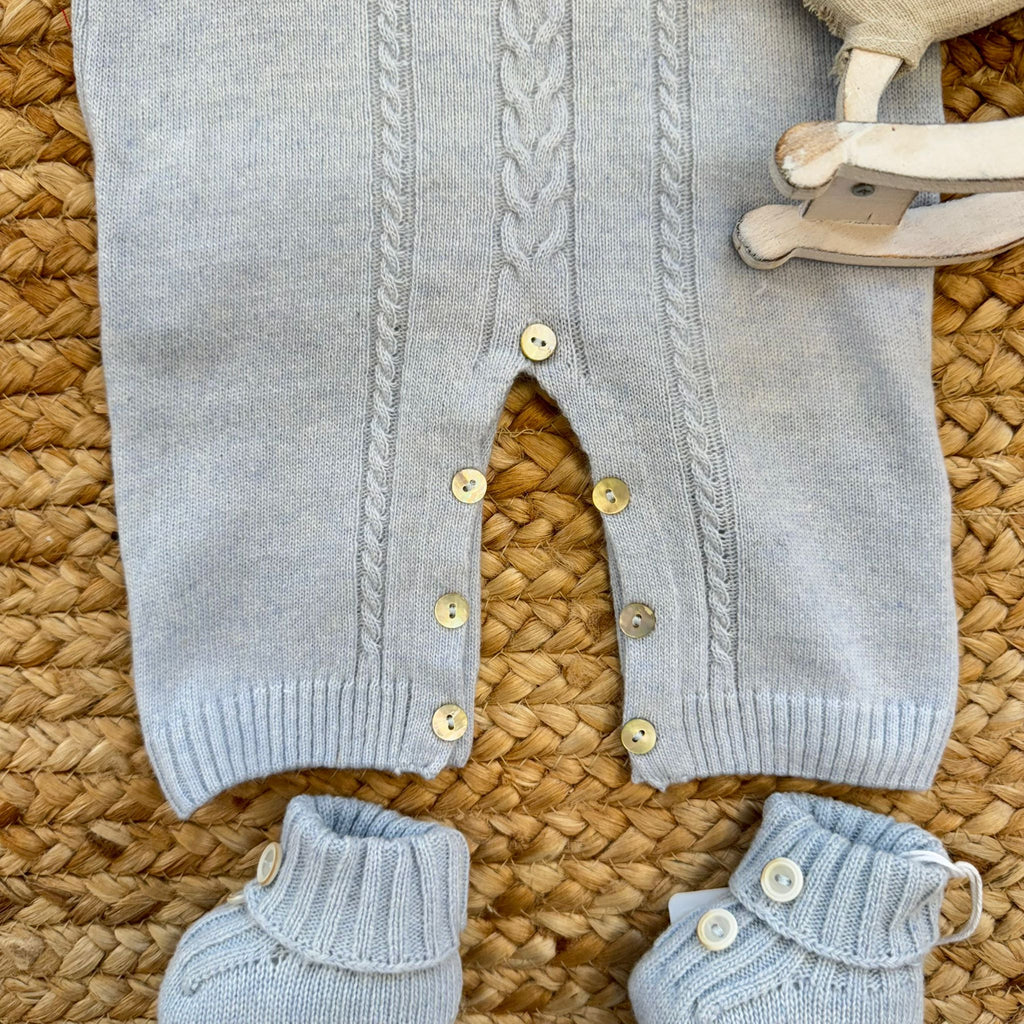 Tutina neonato pura lana azzurra dettaglio bottoncini