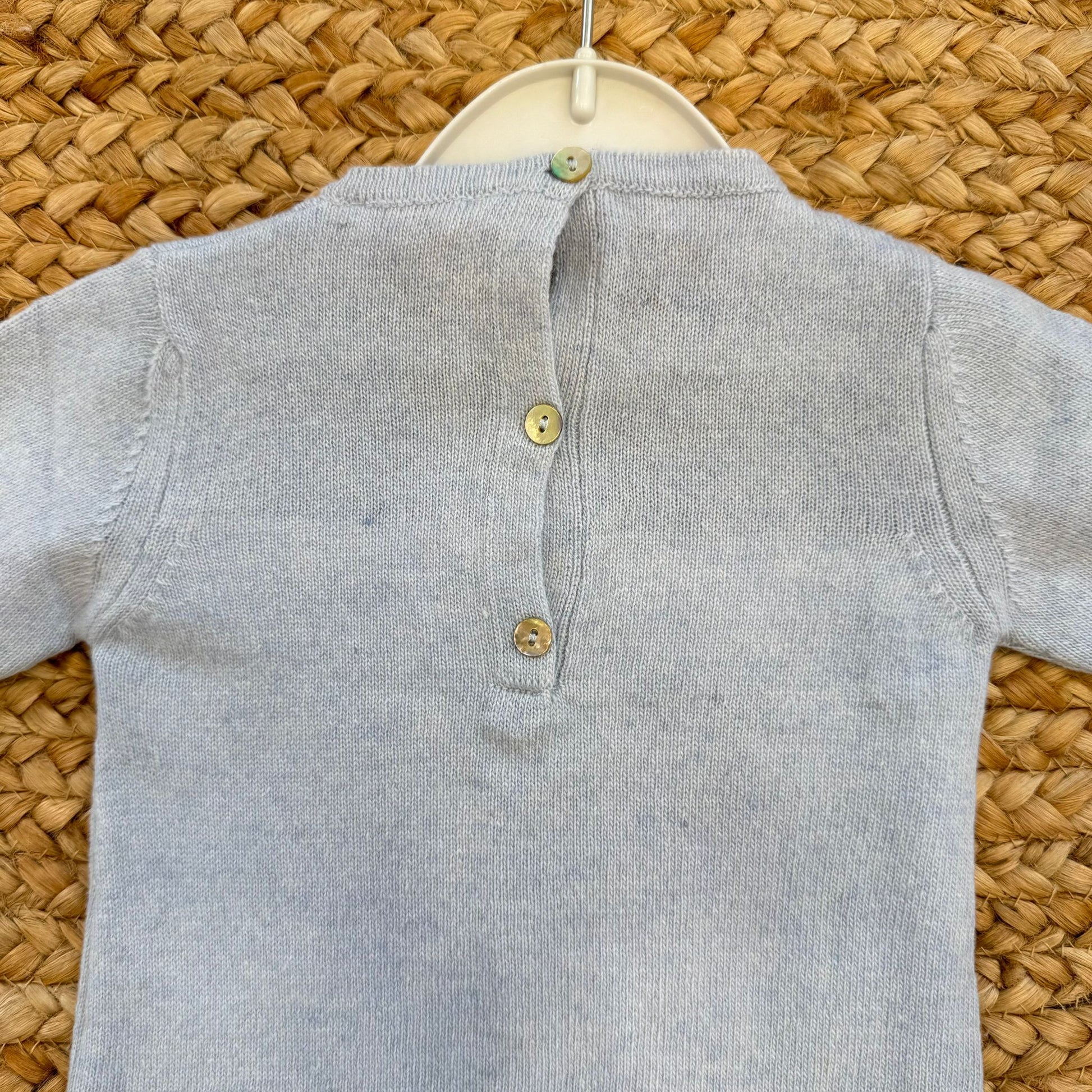 Tutina neonato pura lana azzurra retro con bottoncini