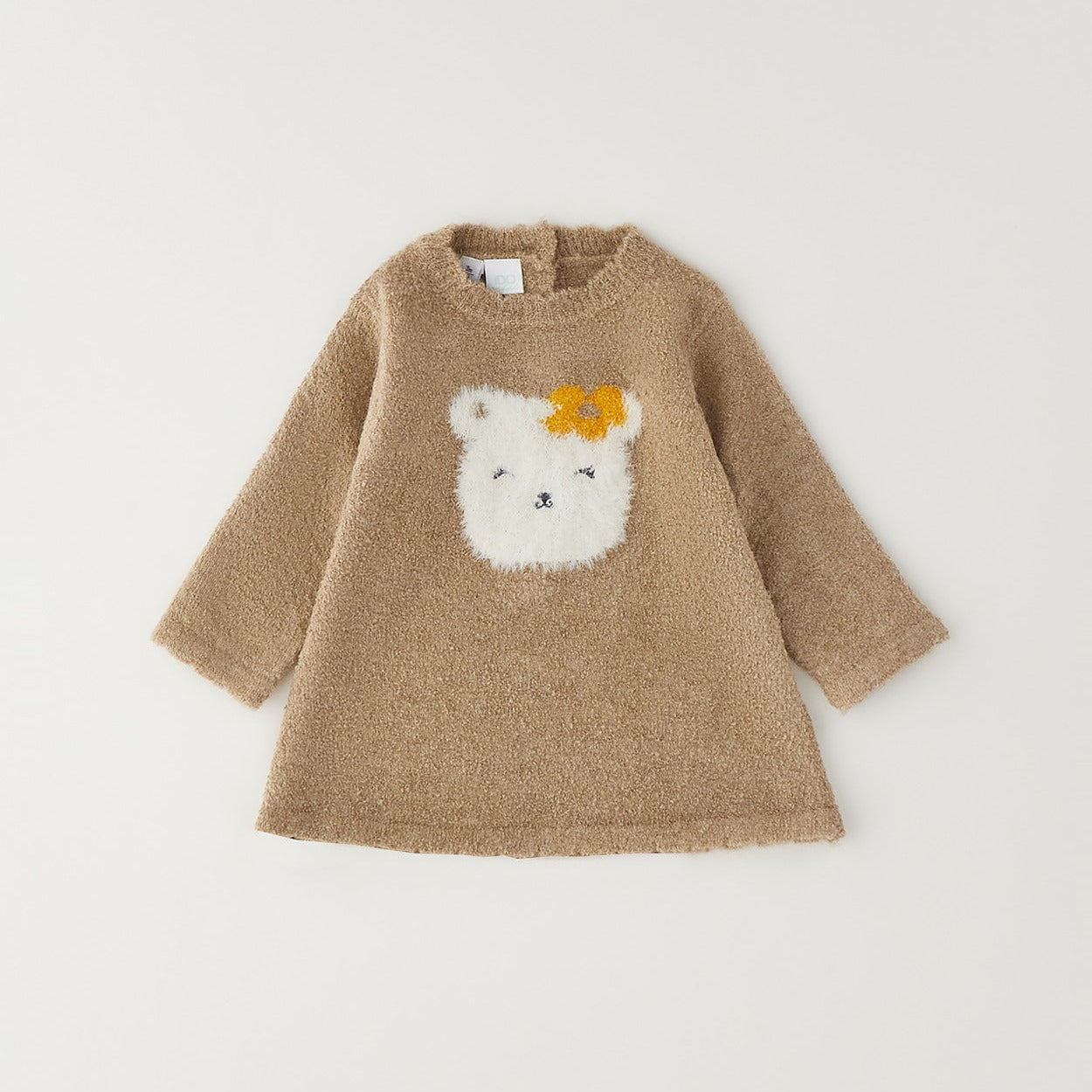 Abitino bimba beige effetto peluche con gattina bianca e fiocco sul davanti