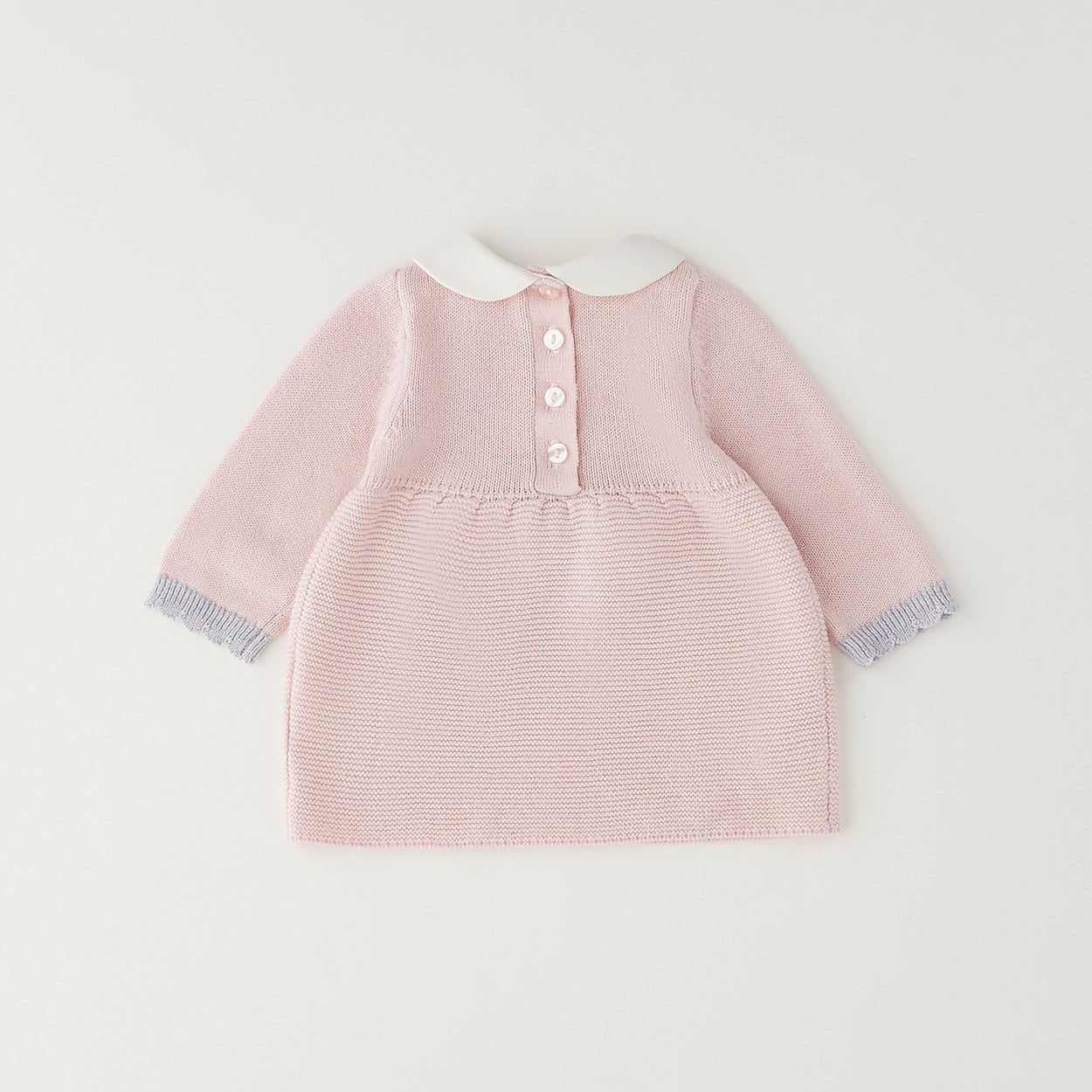 Vestitino neonata rosa in cotone e lana con dettagli grigi, colletto bianco e chiusura posteriore con bottoni.