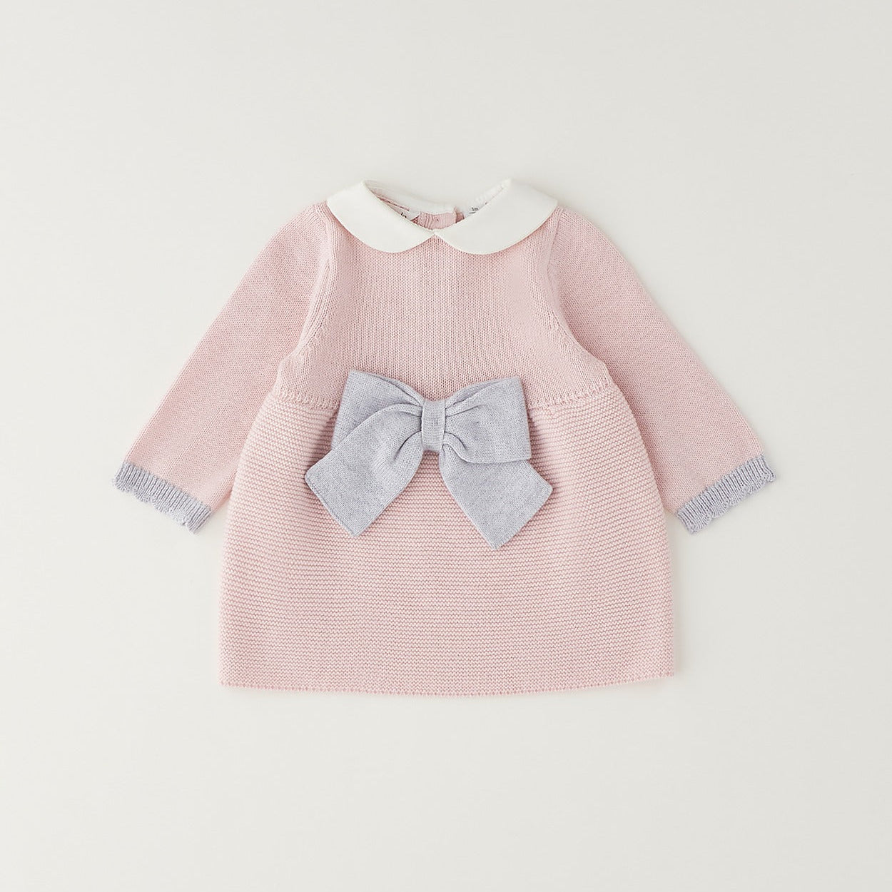 Vestitino neonata rosa in cotone e lana con dettagli grigi, colletto bianco e chiusura posteriore con bottoni.