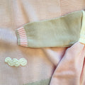 Uscita clinica neonata in pura lana con copertina ricamata nei colori latte, rosa cipria e beige Mars Made in Italy.