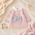 Vestitino neonata rosa in cotone e lana con dettagli grigi, colletto bianco e chiusura posteriore con bottoni.