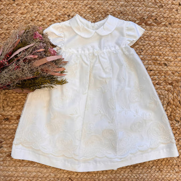 Abito bianco bambina elegante con ricami floreali