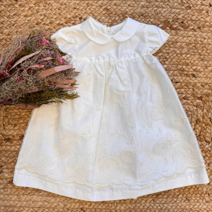 Abito bianco bambina elegante con ricami floreali