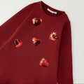 Abito natalizio bambina bordeaux Sarabanda in cotone con cinque cuori di paillettes
