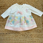 Abito bambina con giacchina bianca, fiocco rosa e fiori ricamati pastello