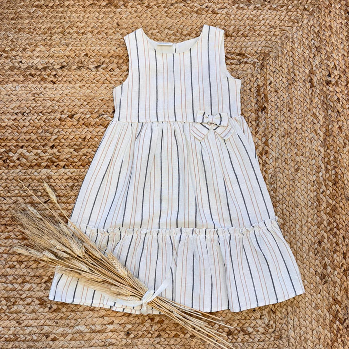 Vestito estivo bambina in lino a righe beige e nere con fiocco.