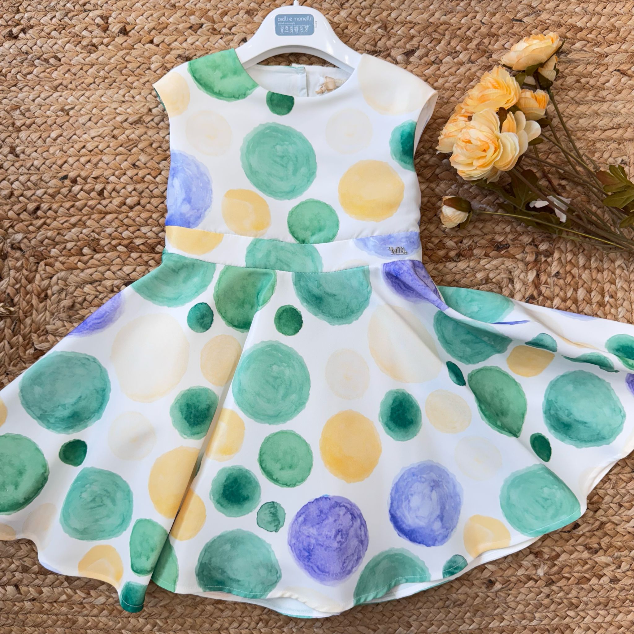 Abito bambina a pois colorati con gonna ampia