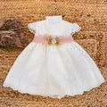 abito battesimo bimba bianco con fascia rosa e fiori in vita