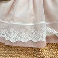 Abito battesimo bimba rosa cipria e bianco con pizzo ricamato