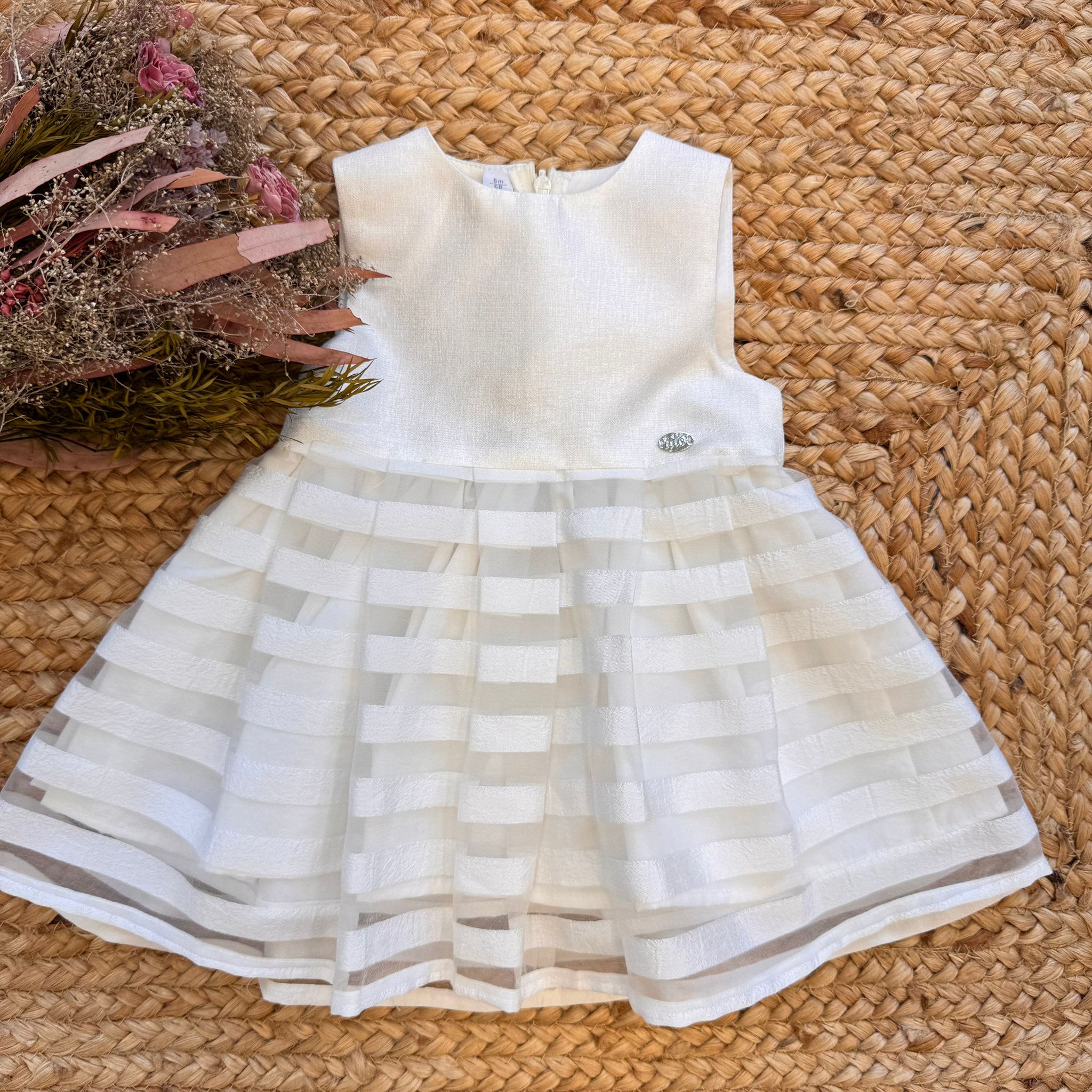Abito da battesimo bimba bianco con gonna a righe trasparenti e tessuto brillante