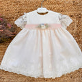 Abito battesimo bimba bianco con fascia rosa cipria e fiori in vita