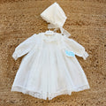 Abito battesimo bimba bianco avorio con smock, pizzo e cuffietta