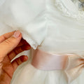 Abito battesimo bimba in tulle e pizzo con fiocco rosa cipria, foto 7