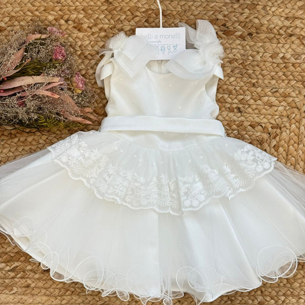 abito battesimo bimba elegante con tulle ricamato e fiocchi sulle spalle