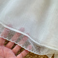 Abito battesimo bimba lungo bianco avorio con smock