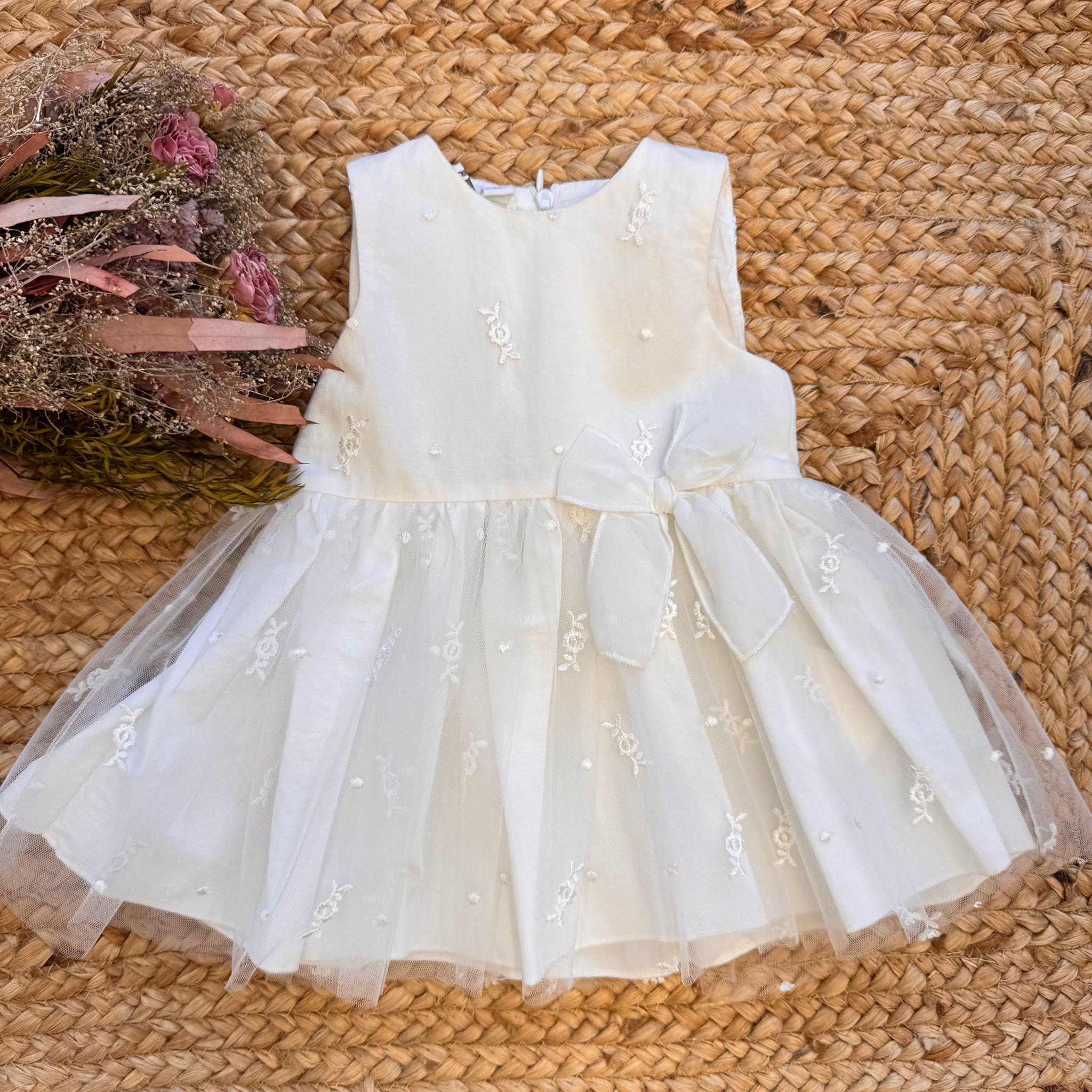 Abito cerimonia bianco bambina con fiocco laterale

