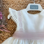 Spallina in pizzo e cintura rosa cipria in tulle


