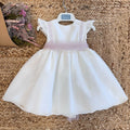 Abito bianco neonata con pizzo e fiocco rosa cipria