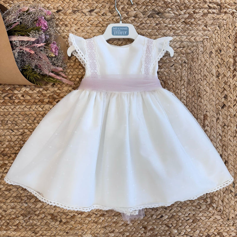Abito bianco neonata con pizzo e fiocco rosa cipria