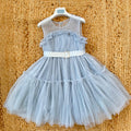 abito bimba azzurro polvere in tulle con fodera interna in cotone