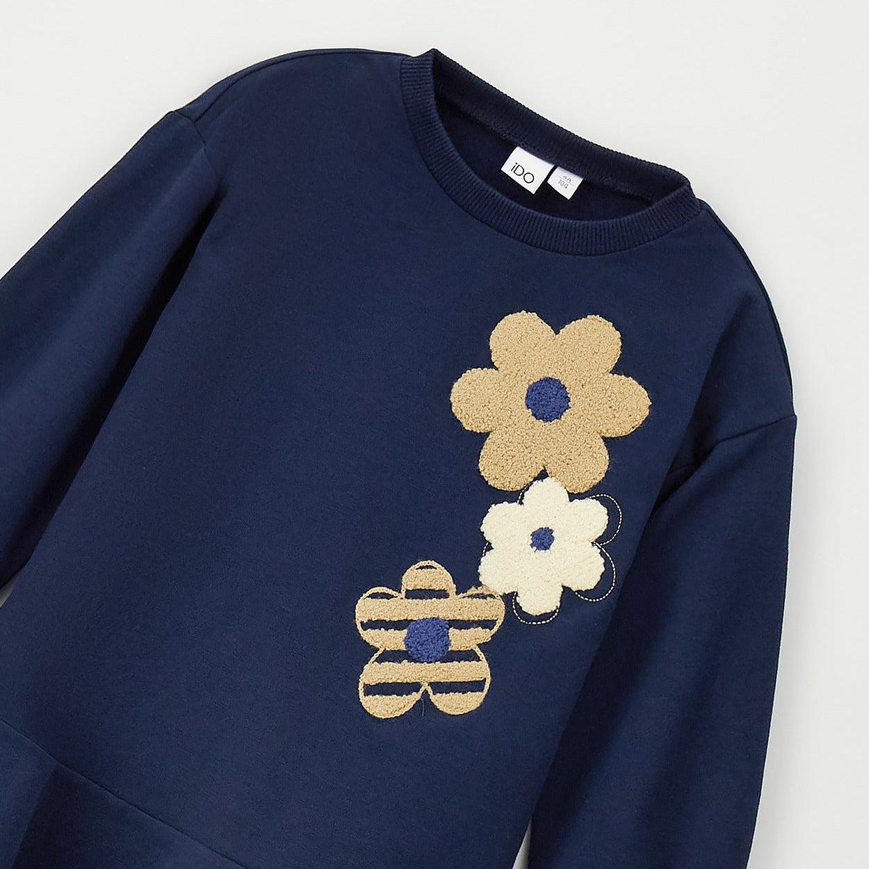 Abito bimba blu in cotone con fiori beige e panna applicati e gonna svasata