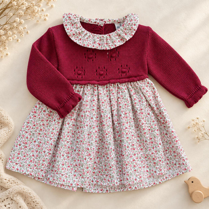 Abito bimba bordeaux in maglia con gonna floreale, colletto volant e fiocco in raso