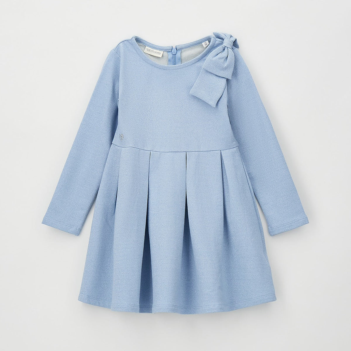Abito bimba celeste lurex con fiocco sulla spalla, maniche lunghe e gonna a pieghe