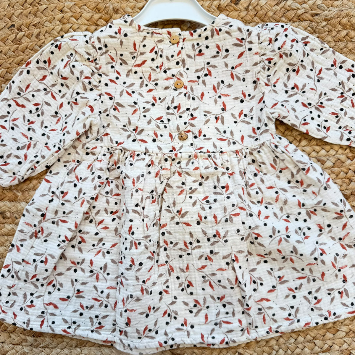 Abito bimba in 100% cotone con fantasia di foglie ruggine tortora e nere