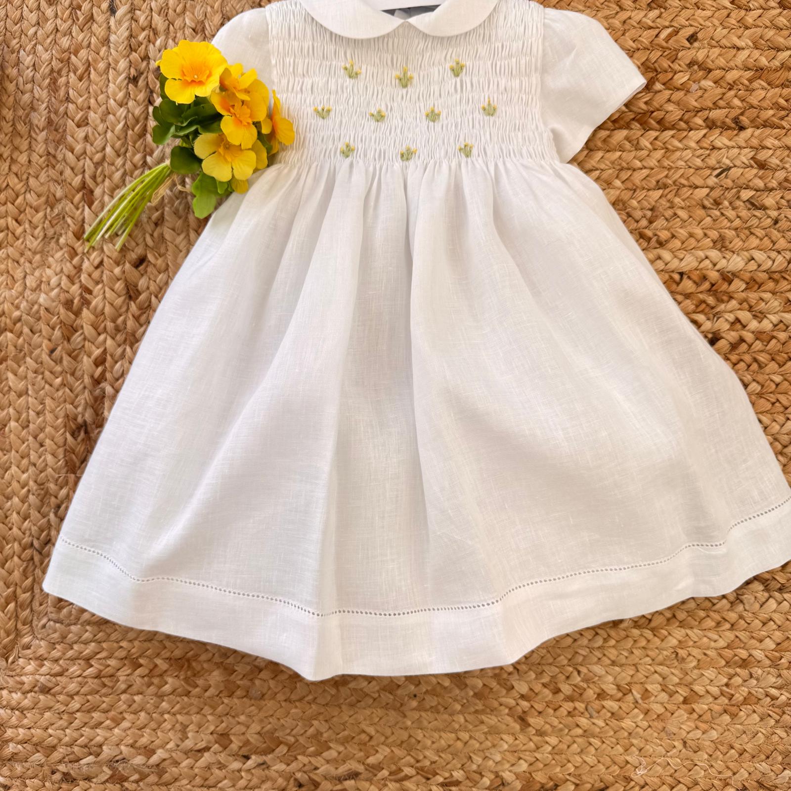 Abito bimba elegante in lino bianco con gonna ampia