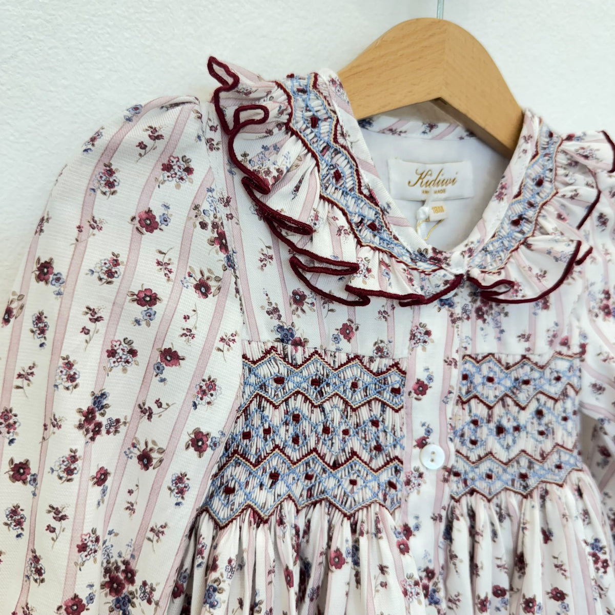 Abito bimba punto smock floreale con fiocchi in velluto bordeaux