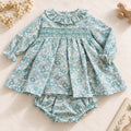 Abito bimba floreale verde acqua in cotone con colletto arricciato e punto smock
