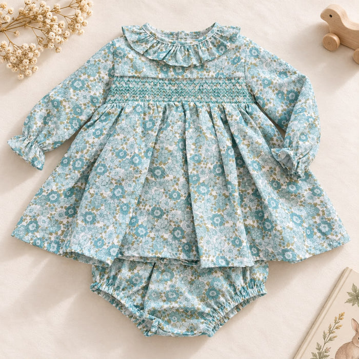 Abito bimba floreale verde acqua in cotone con colletto arricciato e punto smock