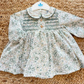 Abito bimba floreale verde Sardon in 100% cotone con punto smock
