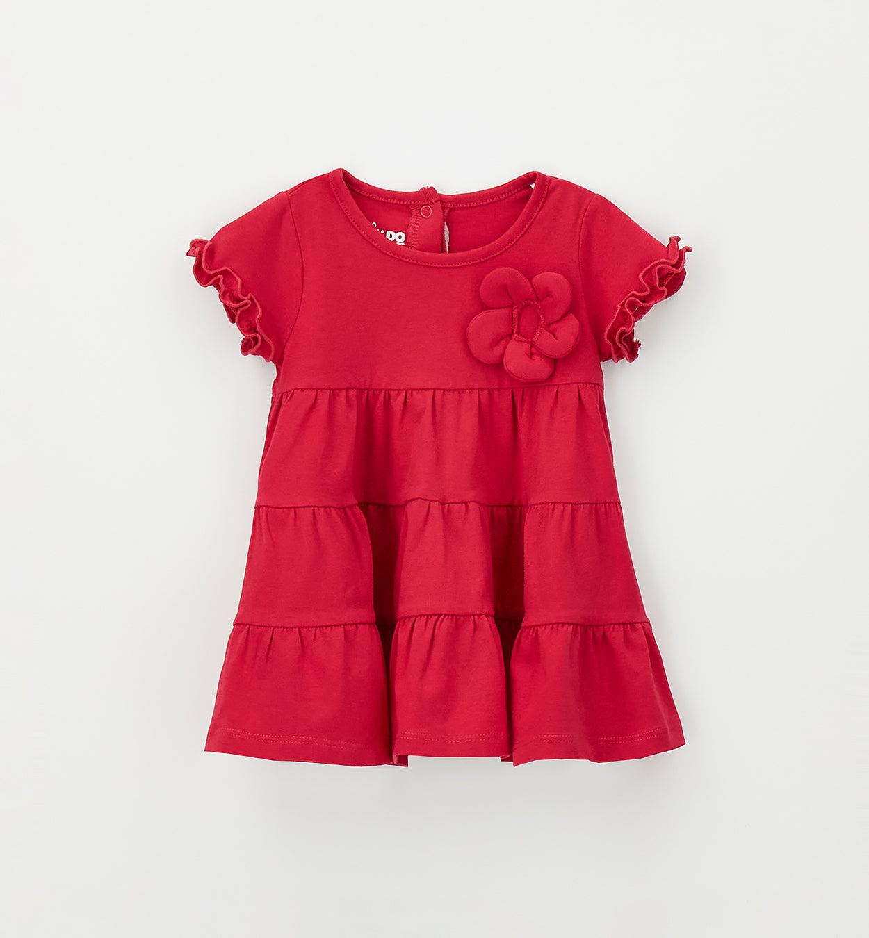 Abito bimba color fragola con fiore applicato e gonna a balze