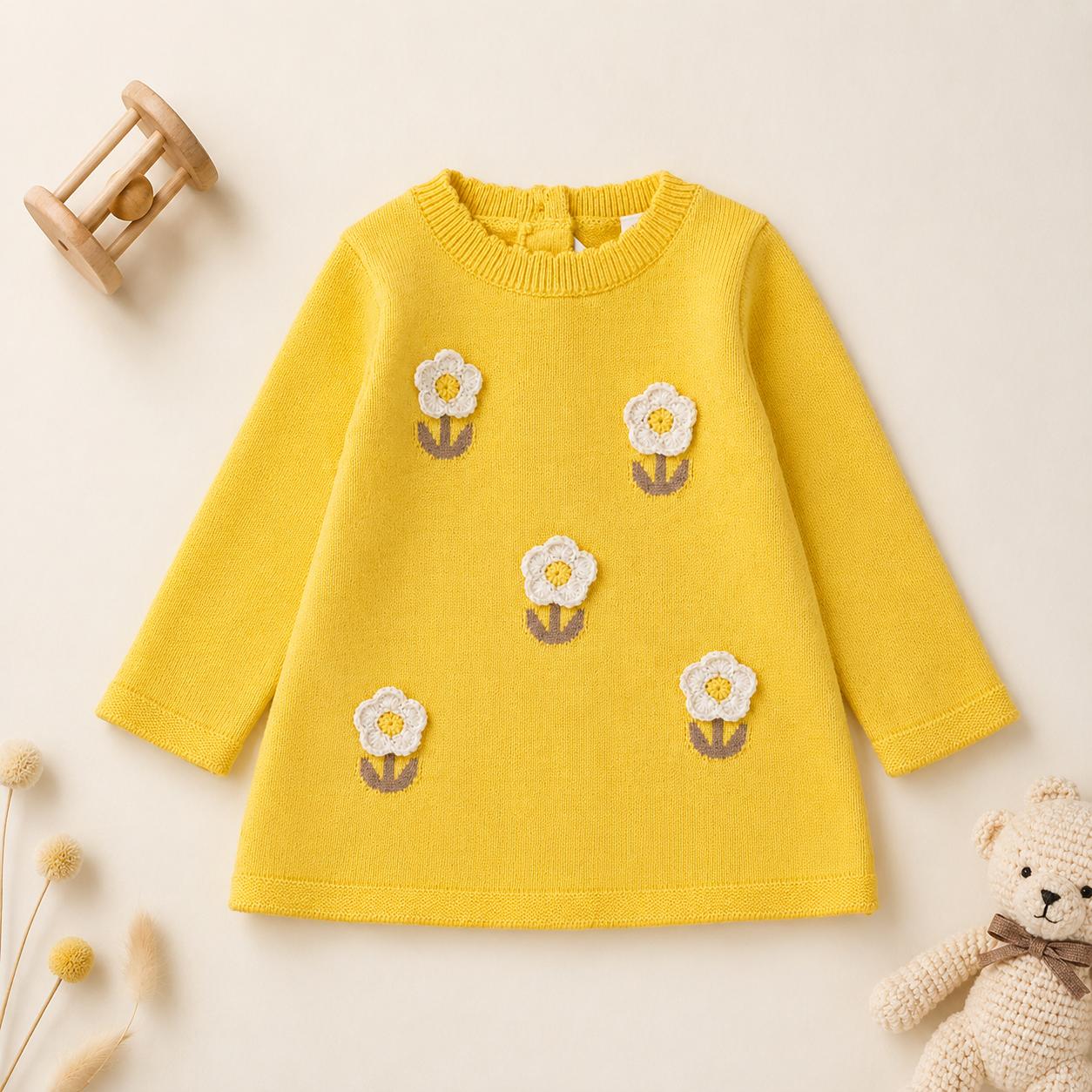 Abito bimba giallo in maglia con applicazioni floreali bianche