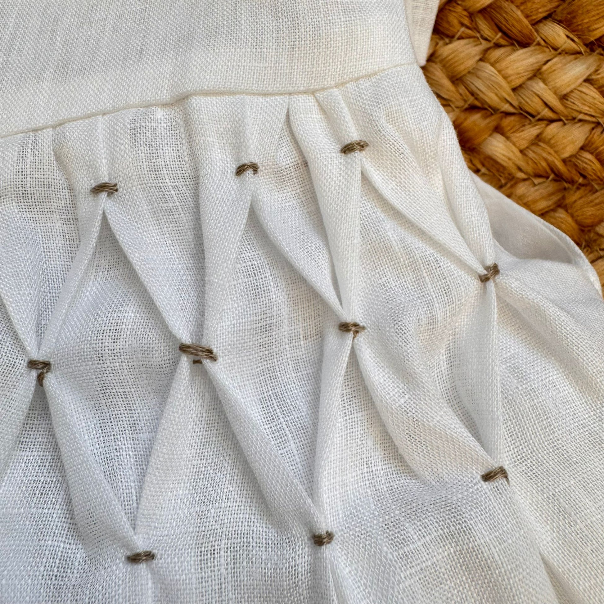 vestito bimba lino bianco con fiocchi sulle spalle