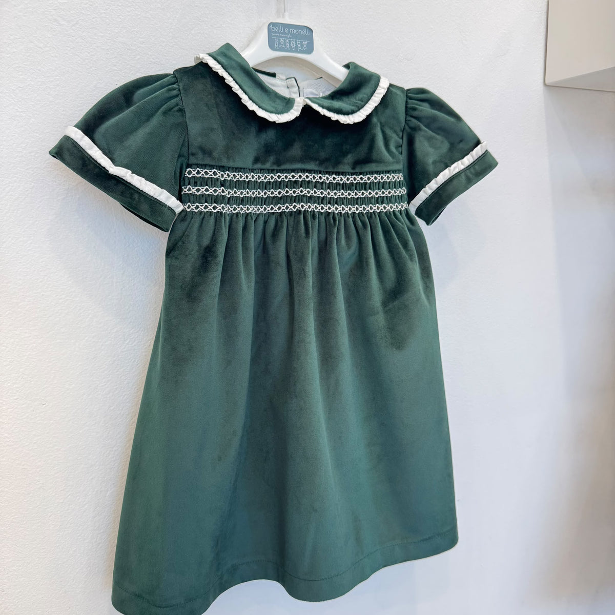Abito bimba primo compleanno in velluto verde bottiglia con punto smock e colletto panna