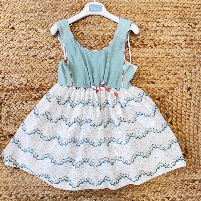 Abito bimba con corpino verde salvia e gonna con onde ricamate

