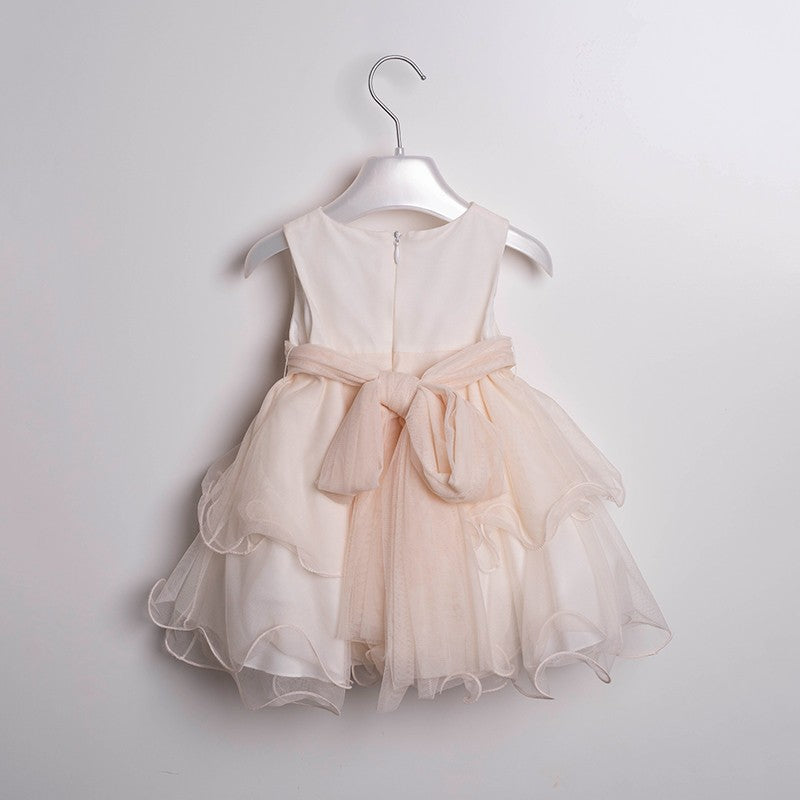 Abito da battesimo bambina in tulle rosa cipria con fiocco e balze – Mimilù